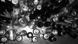 Beer cans and bottles on a floor