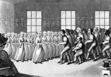 A image of a Shaker religious ceremony, where men and women dance separately. The image is in black and white.
