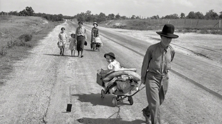 Family Walking on Highway
