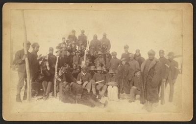 Buffalo soldiers of the 25th Infantry, some wearing buffalo robes, Ft. Keogh, Montana