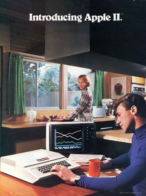 Apple advertisement from a magazine showing a man using the Apple keyboard with a woman looking on while a woman is doing the dishes, May, 1977.