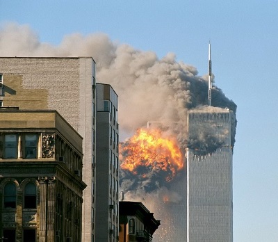 Image of the World Trade Center Towers on fire on the morning of September 11, 2001.